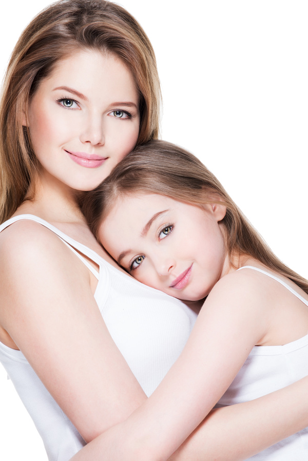 Mom With Her Daughter In White Dresses In The Studio. Stock Photo - Image of mother, flowers 