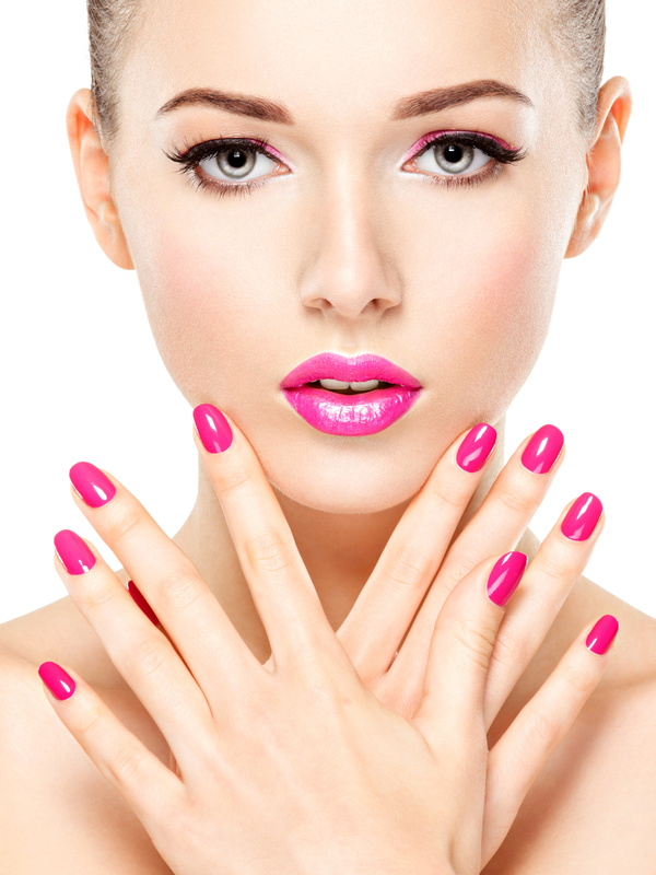 eautiful woman face with pink makeup of eyes and nails. - 웹