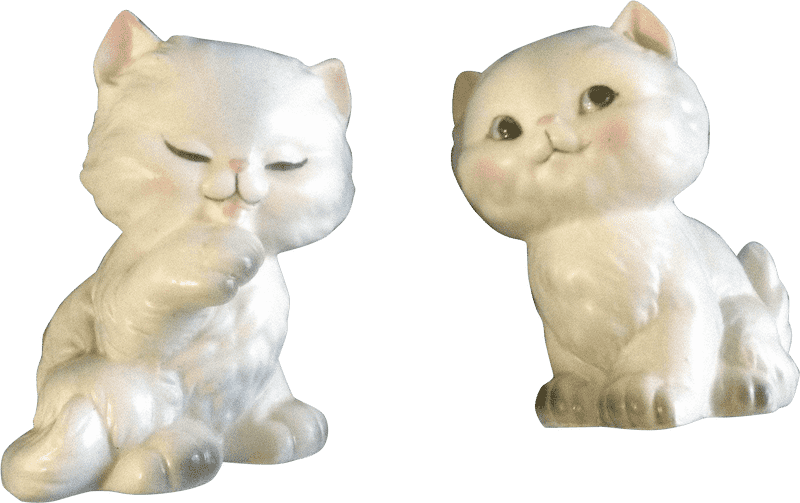 Whimsical White Cat Figurines Delight PNG