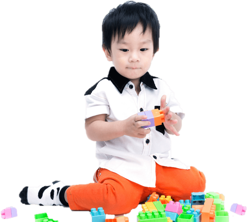 Creative Child at Play with Colorful Blocks PNG