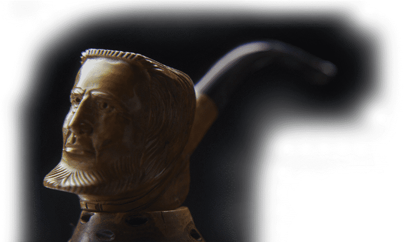 Intricate Bronze Sculpture of a Lifelike Head PNG