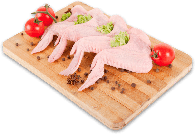 Delicious Presentation of Chicken Wings and Fresh Ingredients PNG