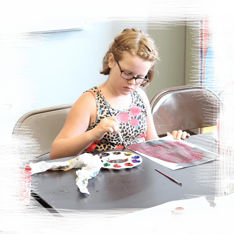 Creative Child at Work on Art Project PNG