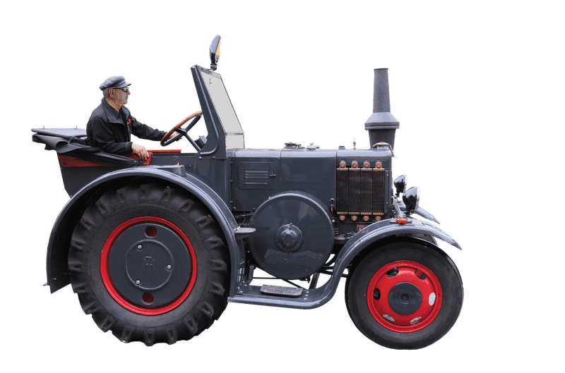 Vintage Farm Tractor in Action PNG