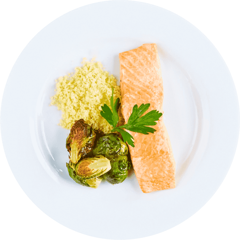 Elegant Presentation of Salmon and Brussels Sprouts PNG