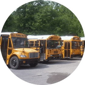 Bright Yellow School Bus Lineup PNG