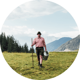 Mountain Walker Through Lush Green Grass PNG