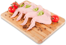 Delicious Presentation of Chicken Wings and Fresh Ingredients PNG