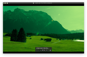 Serene Mountain Landscape with Lush Green Grass PNG