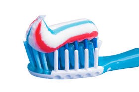 Vibrant Swirls Toothpaste on a Bright Toothbrush PNG