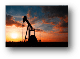 Silhouetted Oil Pump at Sunset PNG