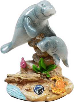 Playful Manatee Family Figurine by the Shore PNG