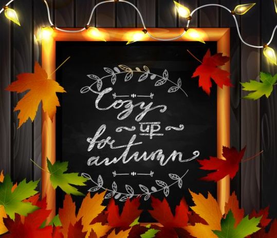 Chalkboard frame with autumn leaves and wooden background 06