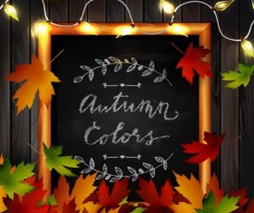 Chalkboard frame with autumn leaves and wooden background 07