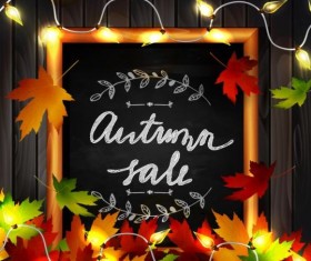 Chalkboard frame with autumn leaves and wooden background 09