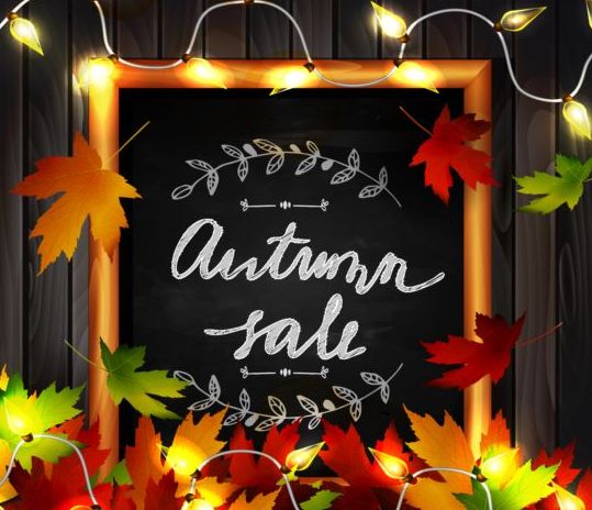 Chalkboard frame with autumn leaves and wooden background 09