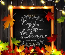Chalkboard frame with autumn leaves and wooden background 11