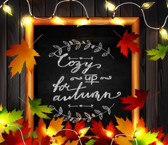 Chalkboard frame with autumn leaves and wooden background 11