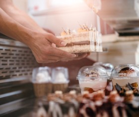 Add the chocolate cake to the container
