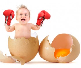 Baby with boxing gloves and broken egg HD picture