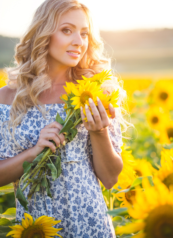 Beautiful girl with sunflowers Stock Photo 01