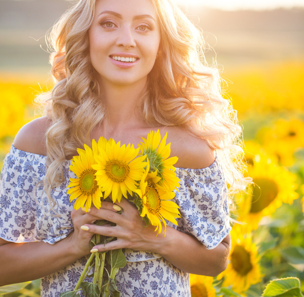 Beautiful girl with sunflowers Stock Photo 02