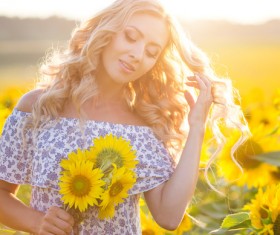 Beautiful girl with sunflowers Stock Photo 03