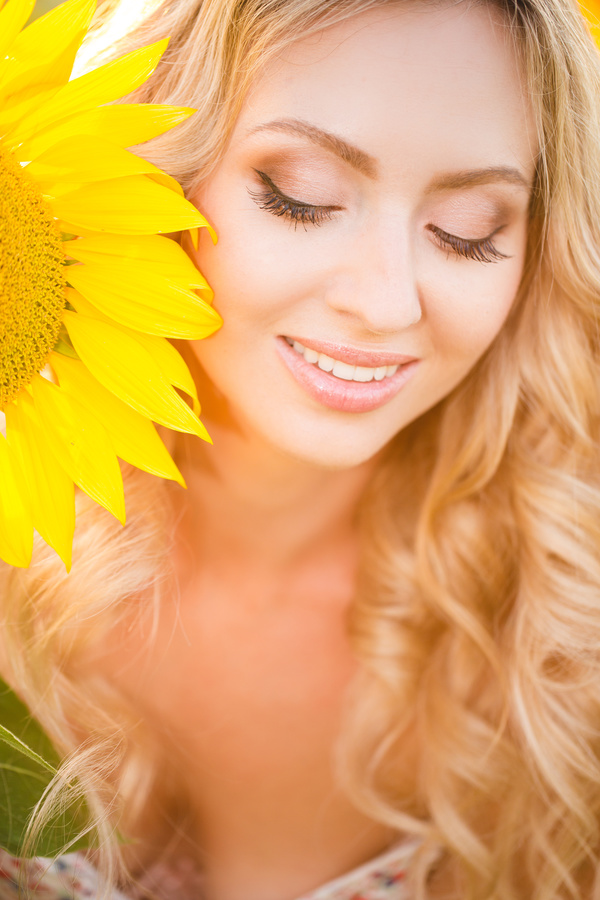 Beautiful girl with sunflowers Stock Photo 08