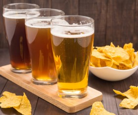 Beer and chips on tray Stock Photo