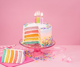 Birthday cake with candles and pink background
