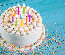 Birthday cake with candles on a blue background