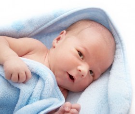 Blanket wrapped in cute newborn baby Stock Photo