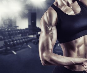 Bodybuilder female body with black background