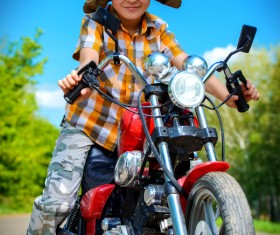 Handsome boy go on a journey on a motorcycle HD picture