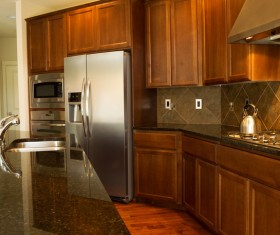 Brown cabinets and kitchen in the high-end kitchen utensils