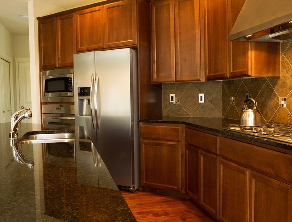 Brown cabinets and kitchen in the high end kitchen utensils