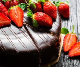 Chocolate cake and strawberry on the table