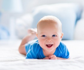 Cute baby in the white sun bedroom Stock Photo