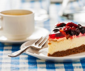 Delicious cheesecake on the table with coffee