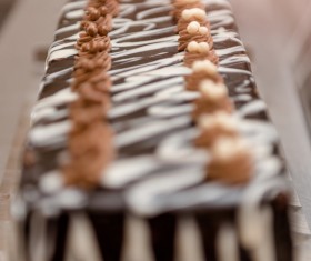 Delicious chocolate cake with vague background
