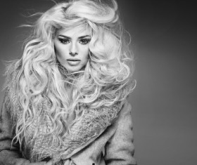 Dressed in stylish blonde beauty Stock Photo