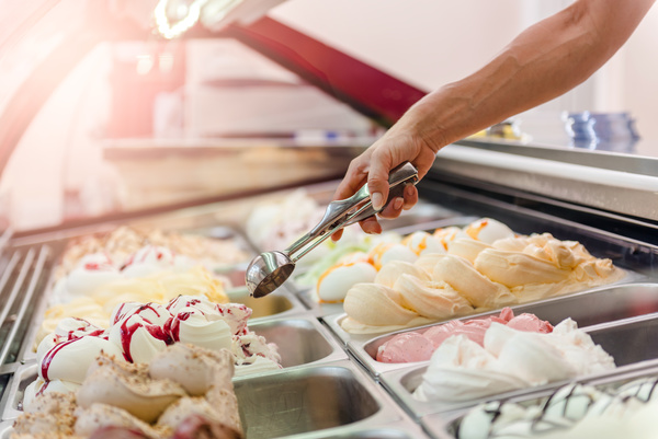 Hand ice cream spoon with all kinds of ice cream HD picture