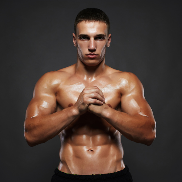 Handsome and strong male model of adult muscle Stock Photo