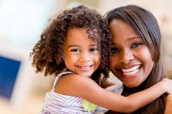 Happy smiling mother and daughter