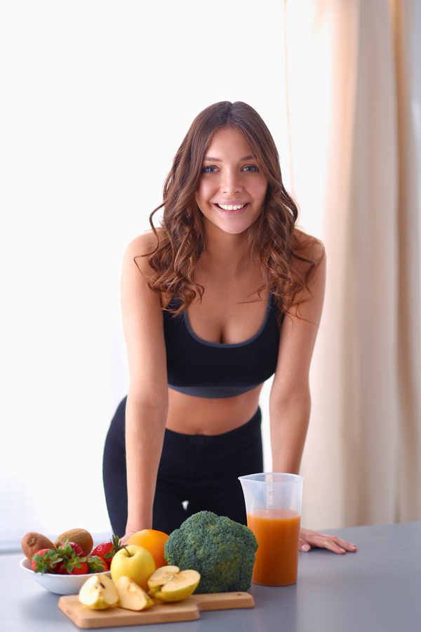 Healthy young woman with healthy vegetables