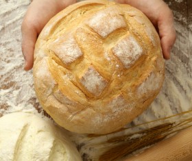 Holding bread and dough on the table
