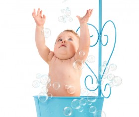 Lovely happy baby bathing Stock Photo