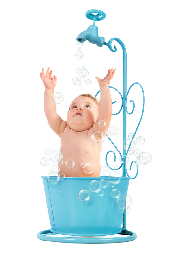 Lovely happy baby bathing Stock Photo