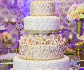 Luxury wedding cake and purple background