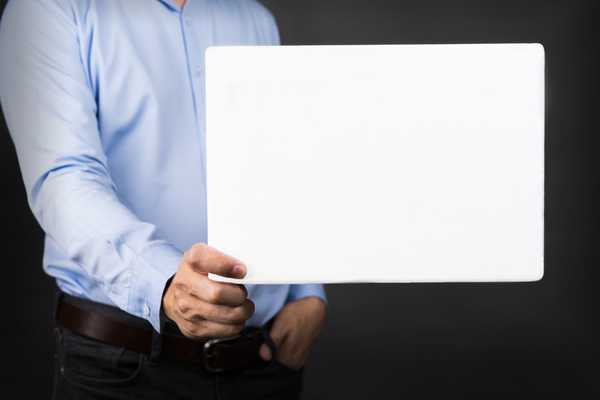 Man holding a blank banner HD picture